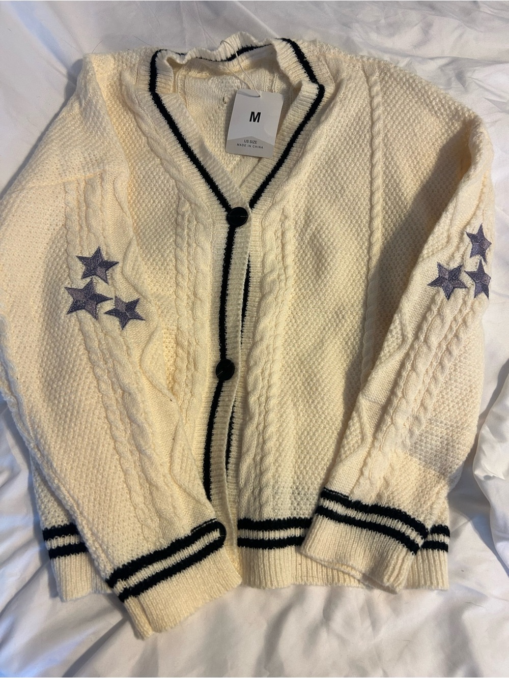 Cream Cable-Knit Cardigan with Navy Trim and Star Embroidery